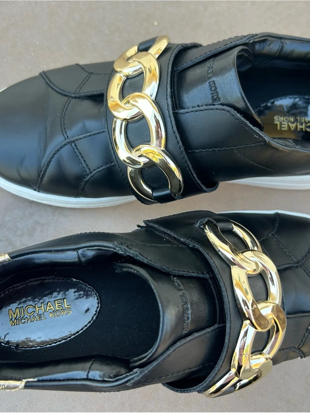 Michael Kors Kenna Black Leather Slip-On Sneakers with Gold Chain Accent Sz 8.5